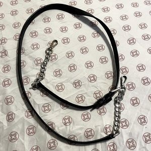 Michael Kors black crossbody strap with silver hardware